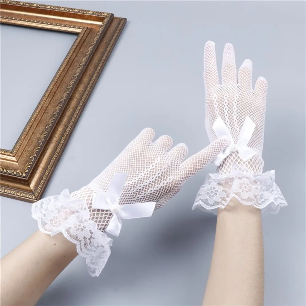 

1pair Bride Stretchy Fishnet Lace Gloves Five-finger Hollowout Gloves with Lace Pearls Bow Tie Lace Mesh Gloves Bride