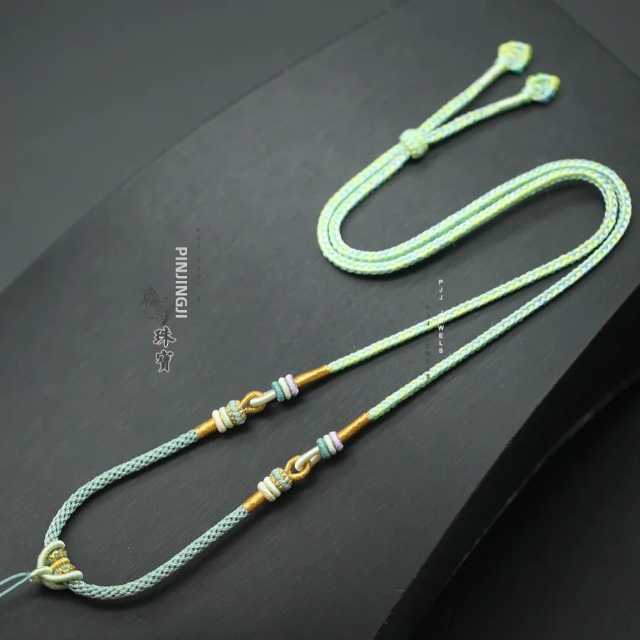 handcrafted-silver-and-gold-buddha-pendant-necklace-with-adjustable-cord-for-men-and-women-high-end-jewelry-peace-buckle