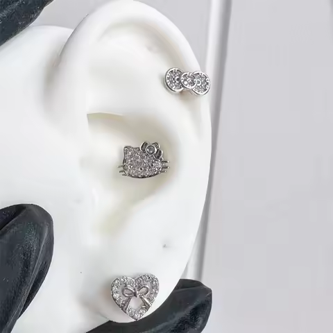 1PCS 귀여운 새끼 고양이 사랑 심장 Bowknot 스테인레스 스틸 귀 뼈 네일 실버 컬러 귀걸이 여성을위한 달팽이관 피어싱 바디 쥬얼리