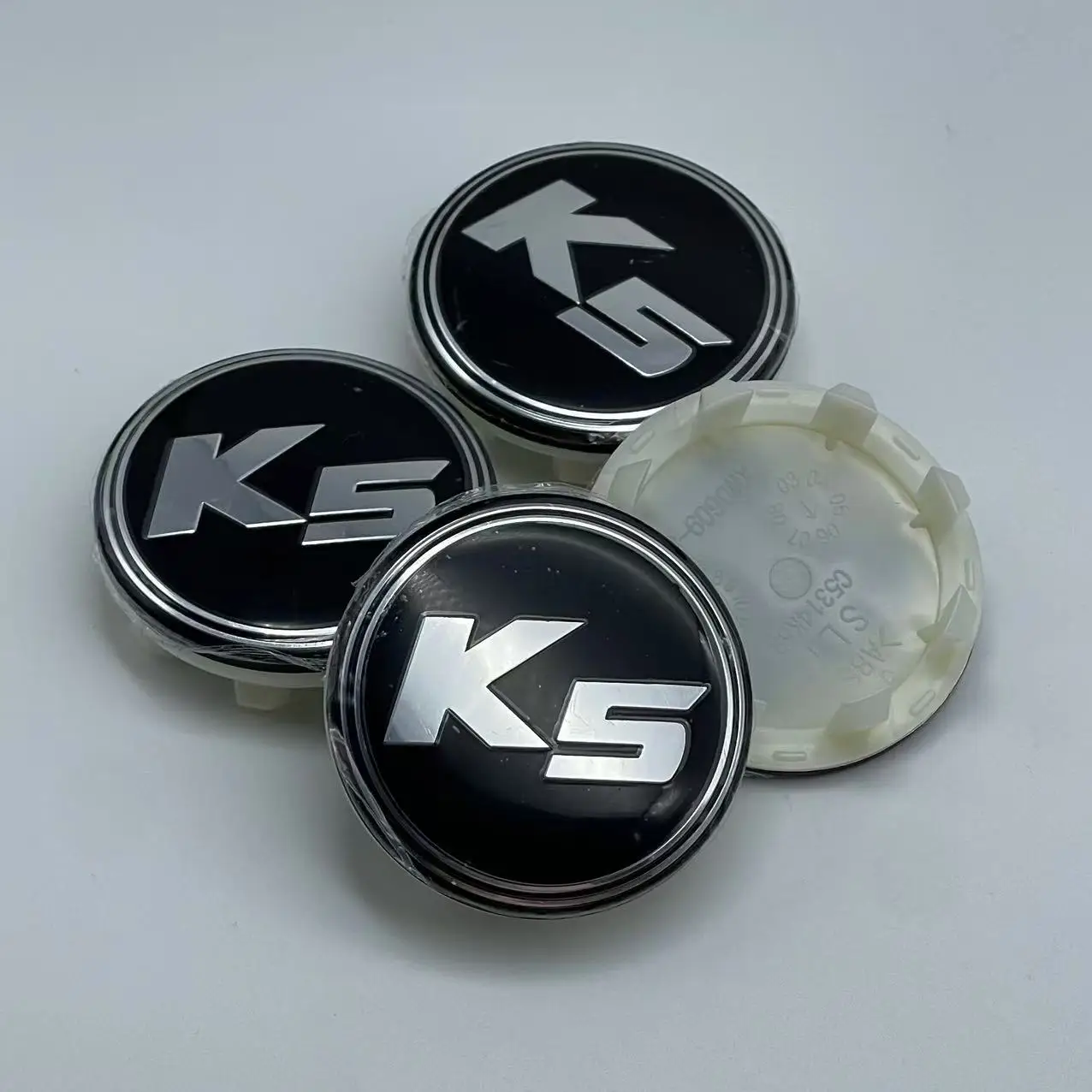 

4pcs 58mm car hub center cover auto parts automobile modified wheel hub cover is suitable for K5 Souranto rio sports.