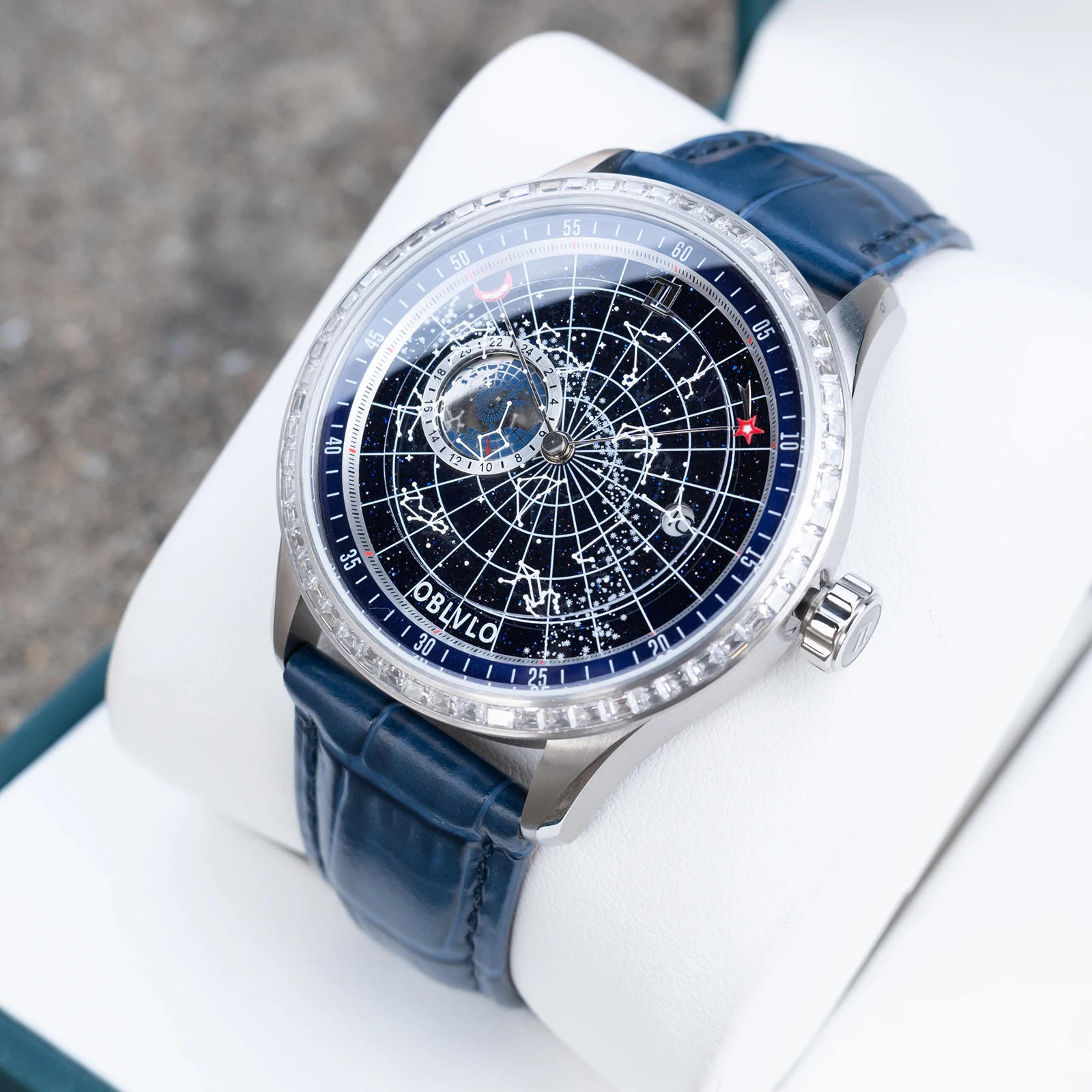 

OBLVLO Mens Elegant Watch with Diamonds Bezel Super Luminous Blue Leather Strap Earth Star Automatic Mechanical Movement GC-Star