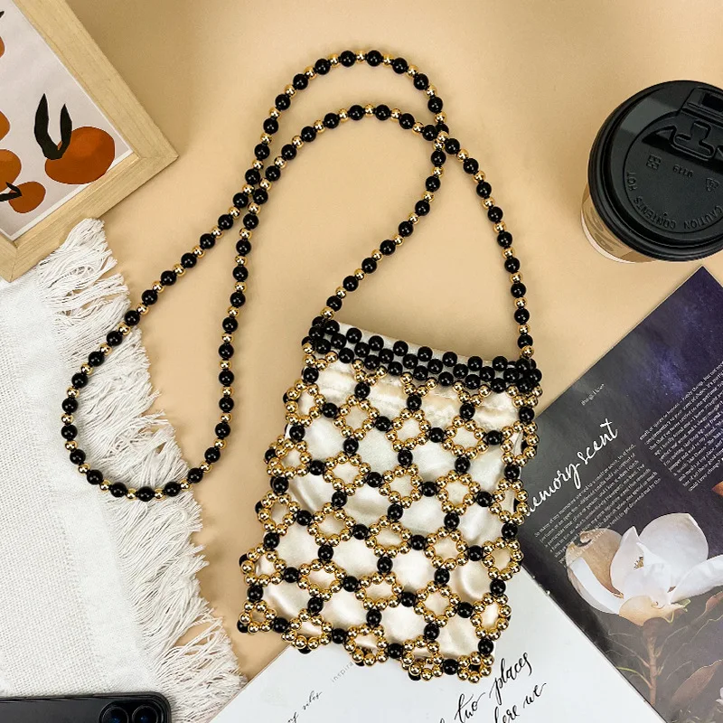 

2026 French Vintage Black and Gold Contrasted Beaded Bag, Hollowed-out Hand-woven Crossbody Bag Designer Chain Mobile Phone Bag