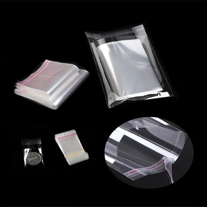 100pcs transparent OPP self-adhesive glass paper bag, self sealing packaging bag for candy, biscuits, toys and party gifts