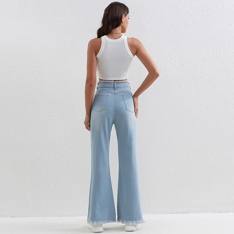 Jeans da donna svasati con orlo effetto consumato alla moda Pantaloni in denim lavati blu vintage Pantaloni strappati alla moda