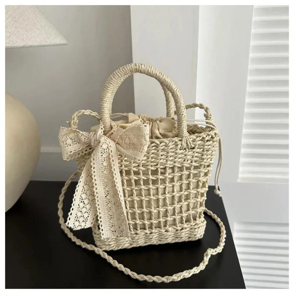 Borsa a tracolla casual da donna in tessuto di paglia con fiocco in pizzo di design di lusso borsa da spiaggia estiva piccola borsa a secchiello