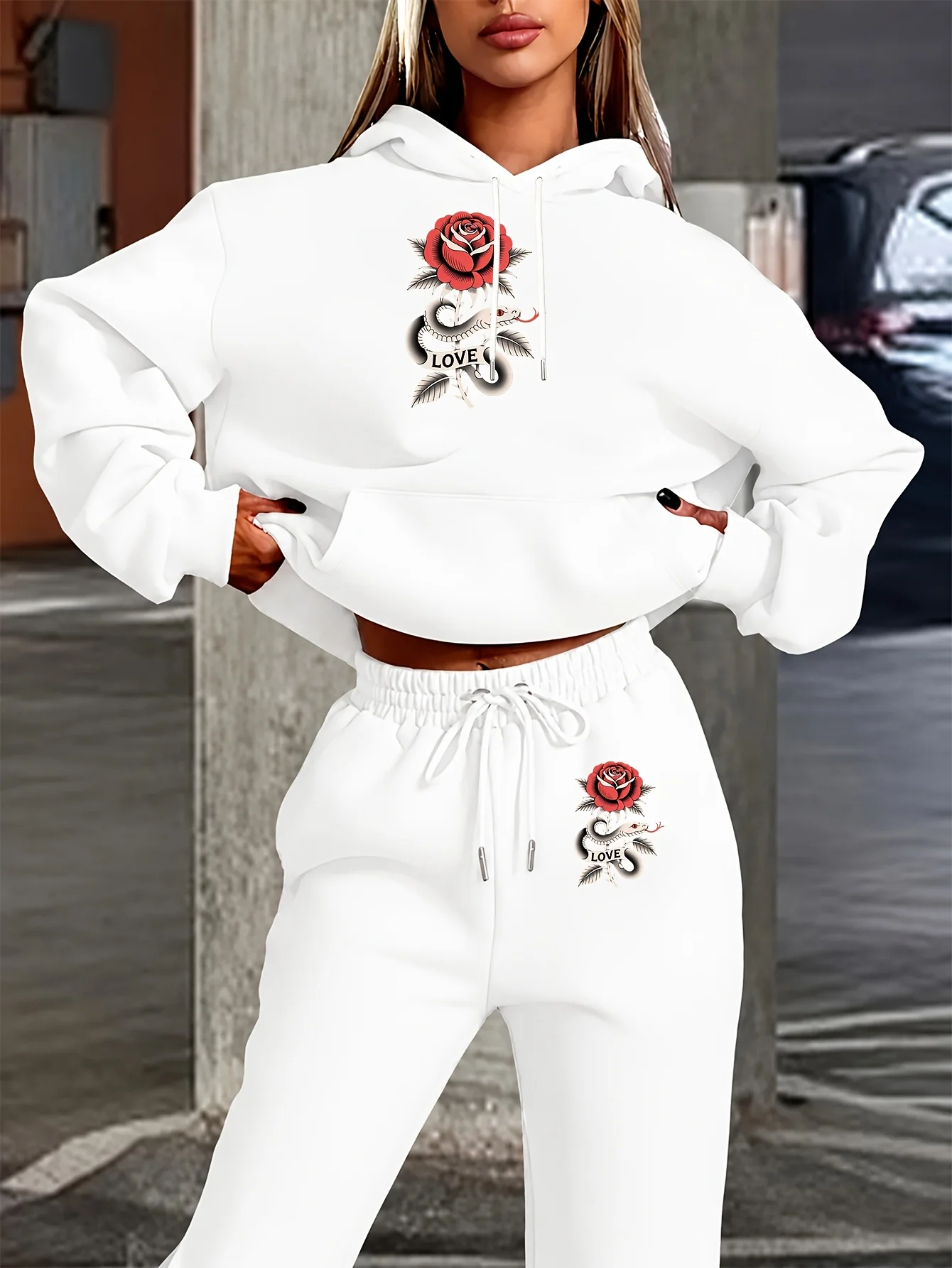 Ladies two‑piece hoodie tracksuit featured with unique traditional tattoo‑style snake‑rose‑heart print