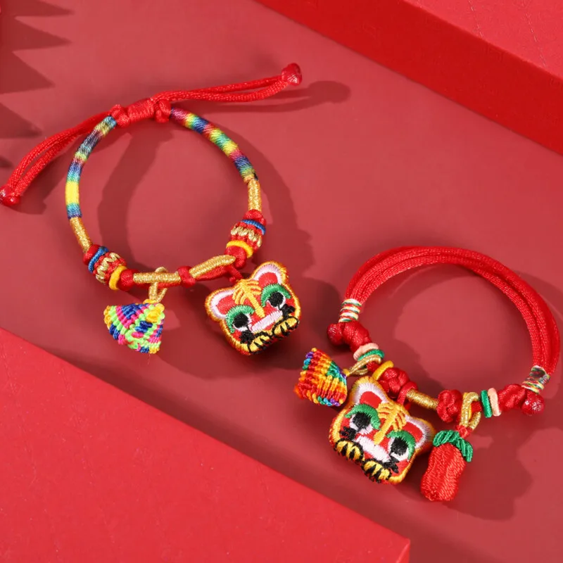 

Baby Embroidered Tiger Head Hand Red Rope Fetal Hair Bag Dragon Boat Festival Zongzi Lion Dance Pendant Children's Bracelet