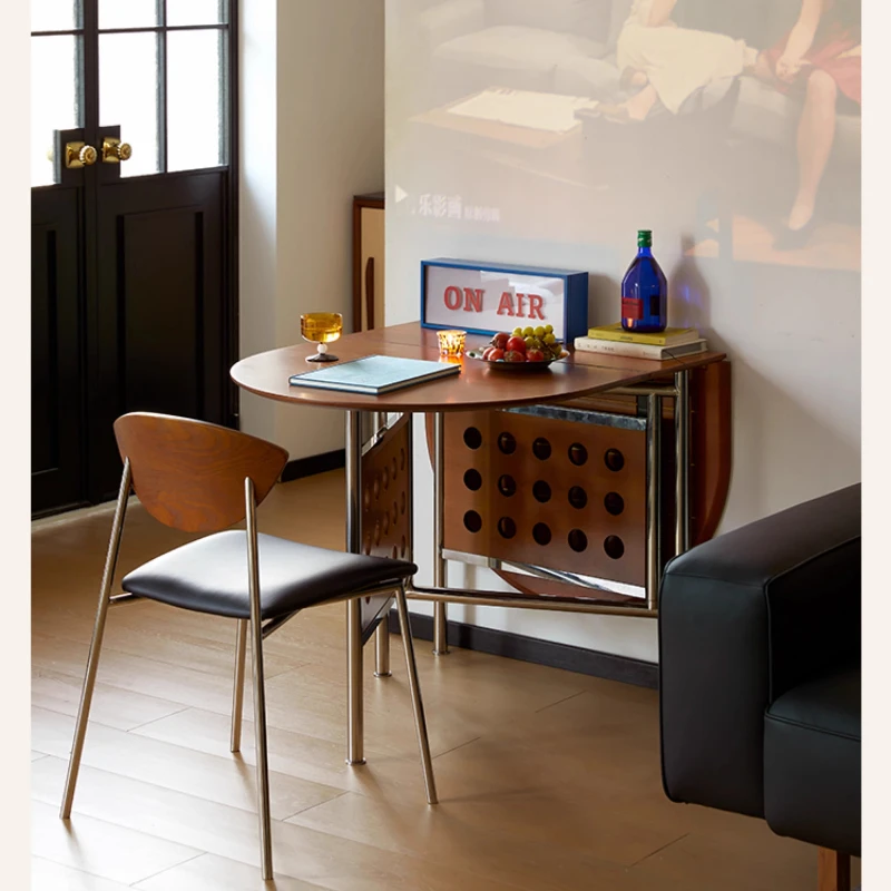 

Foldable dining table and chair combination oval Nordic medium and ancient style household small apartment solid wood