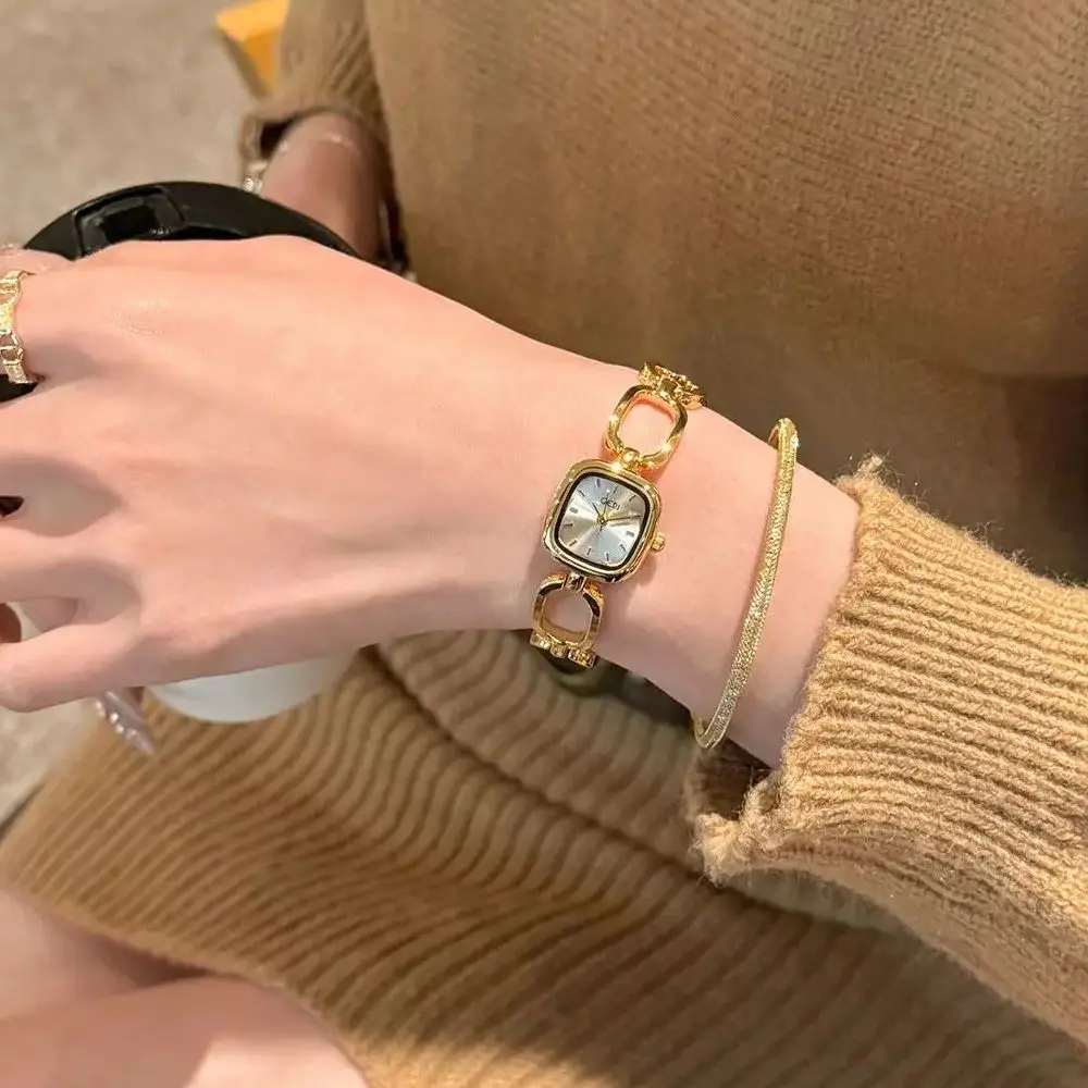

Легкие роскошные женские часы, минималистичный дизайн, темперамент, элегантный изысканный квадратный полый браслет, кварцевые женские часы, подарок