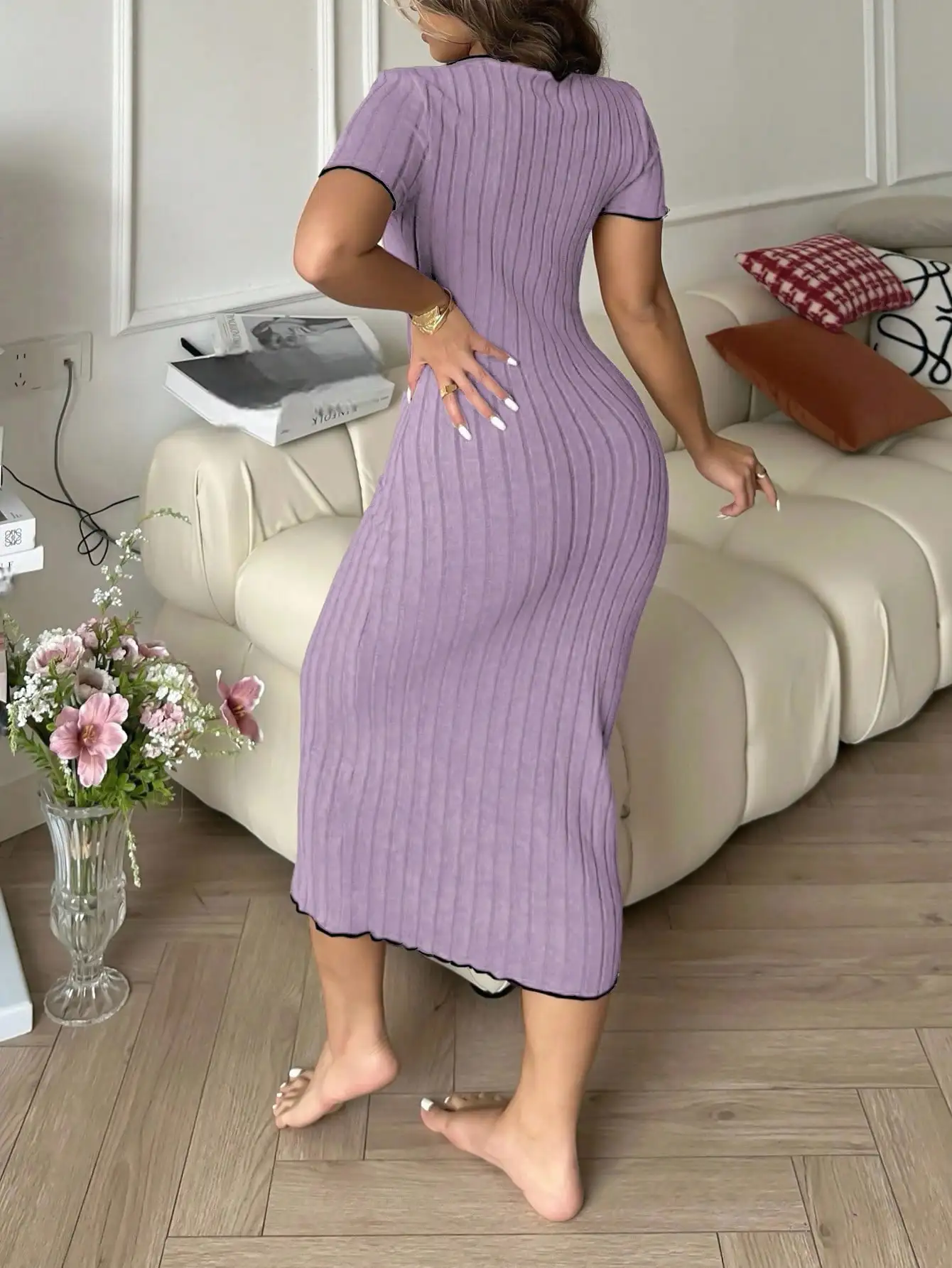 

Pink Ribbed Knit Dress with Black Bow Trim and V-Neck Detail