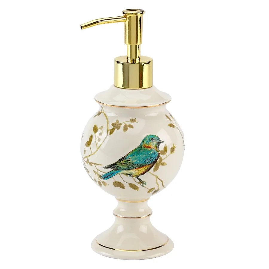 

Elegant off-white ceramic lotion pump with gilded bird design ideal for bathroom or vanity use combines artistic craftsmanship