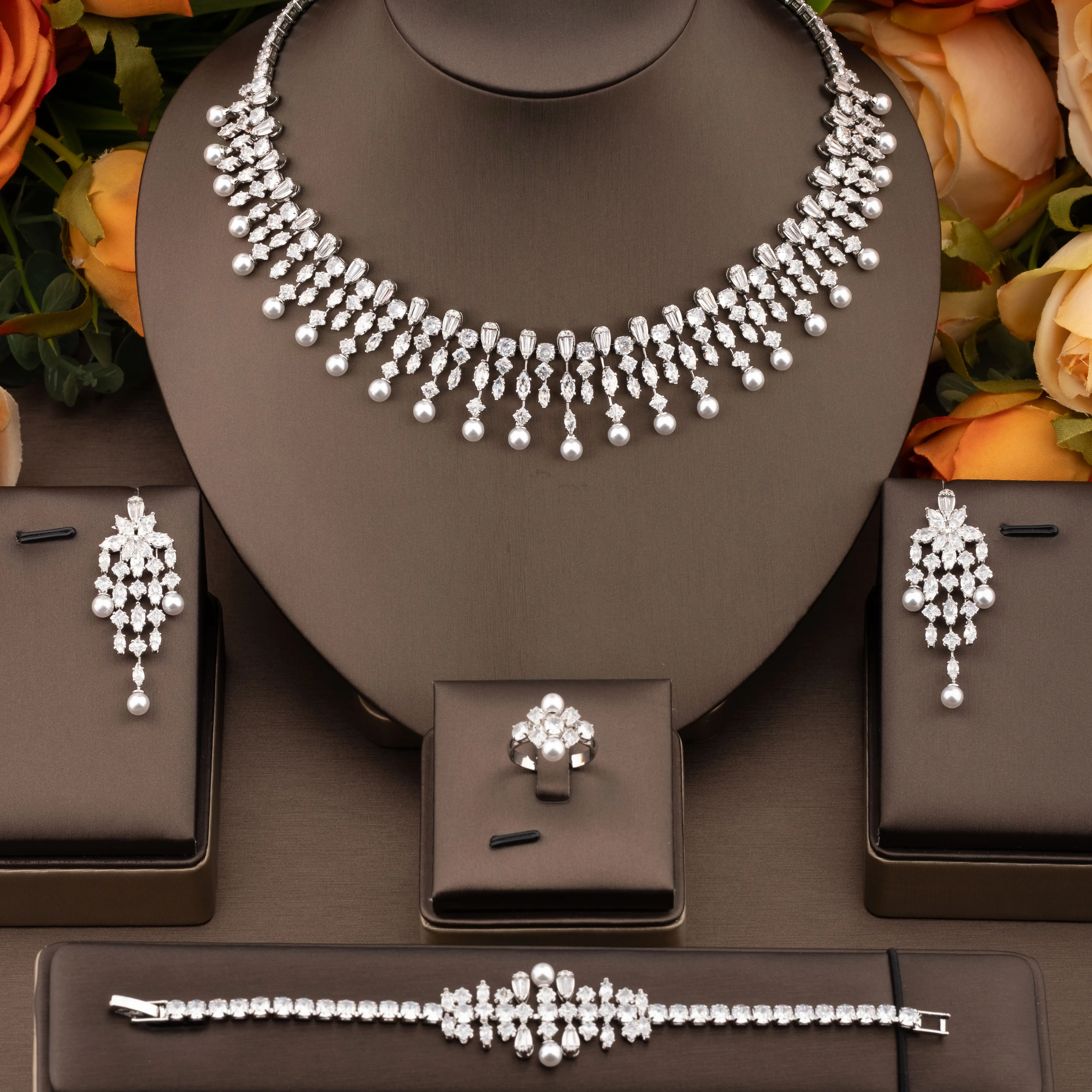 

1 комплект роскошных и элегантных украшений с блестящими кубическими циркониями и искусственным жемчугом, подходит для женщин.