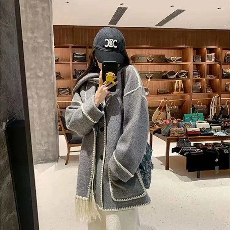 Double-sided wool coat shell embroidery 2023 autumn and winter new tassel woven ditch edge with scarf woolen coat women