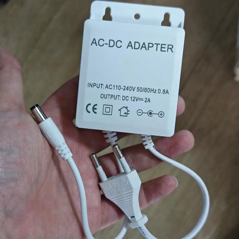 1 sztuka wodoodpornego zasilacza 12V 2A z wtyczką EU do kamer CCTV, kamer AHD, NVR, DVR – wejście AC100V–240V
