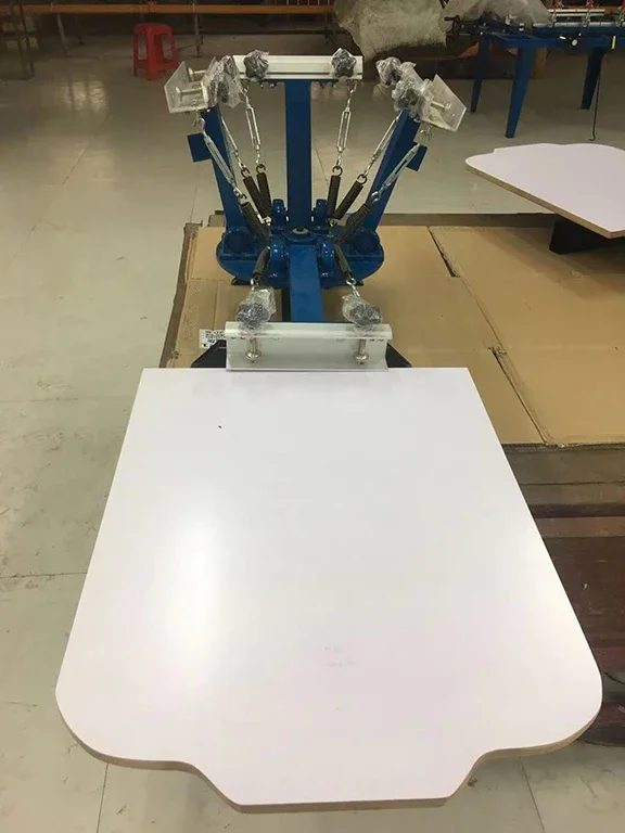 

-Four-color Single Station Manual Silk Screen Printing Machine T-shirt Personalize Non-woven Bags Screen Printer