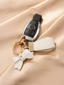High end artificial diamond car keychain pendant, exquisite pink bow, lychee pattern hand rope keychain, exquisite ins car chain 10 best sales diamond key chain - №5