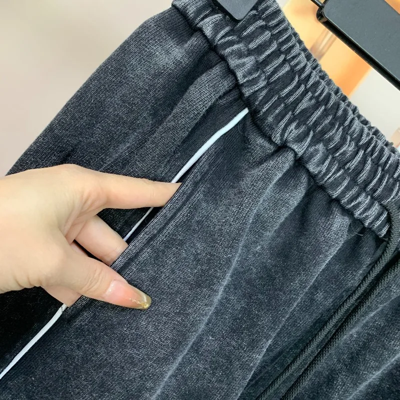 Trendige Marken-Jeans im amerikanischen Stil für Frühling/Sommer: Schwerer Patchwork-Farbblock mit Cartoon-Motiven, gerade geschnitten, schlank machend, lässige lange Denim-Hose