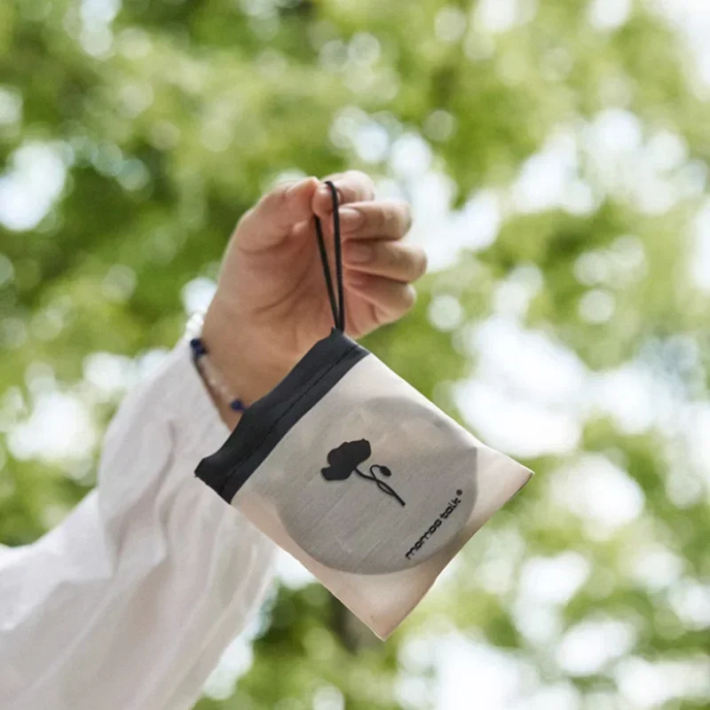 Portable handheld folding fan with storage bag, compact and portable, suitable for outdoor activities in summer