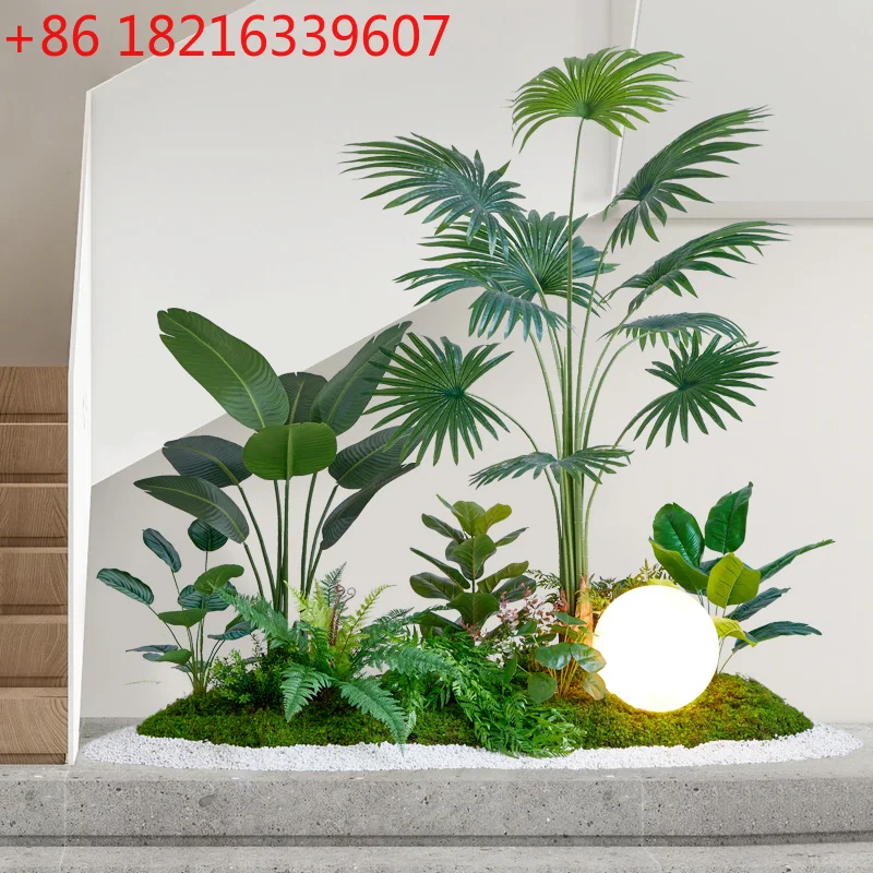 

Simulated plant landscaping decoration Fake green plants potted trees arrangement at the lower corner of the stairs