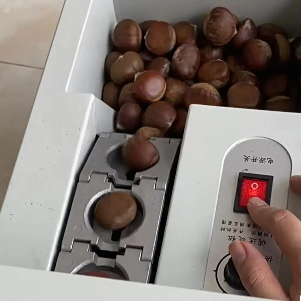 

Электрическая машина для открывания каштанов Полностью автоматическая машина для резки каштанов