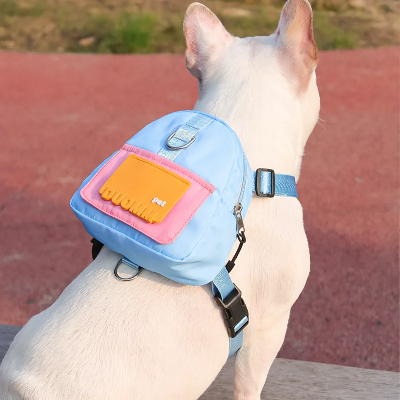 

New Style Pet Backpack Easy to Extract Garbage Bags Waterproof Can Bring Food Free Leash Cartoon Design Dog Harness Supplies