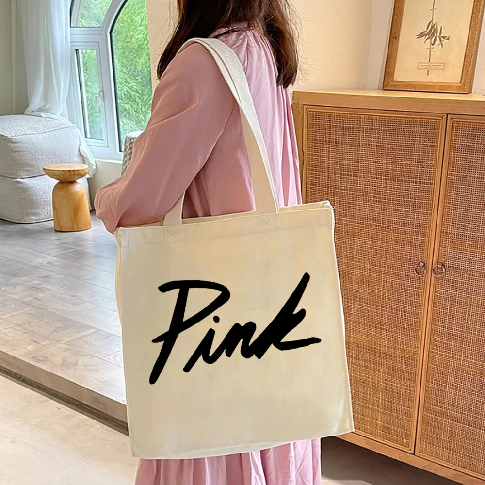 Bolso de lona con estampado de logotipo rosa para mujer, bolsa grande para viaje, oficina, universidad, bolsa de comestibles, resistente y bonita