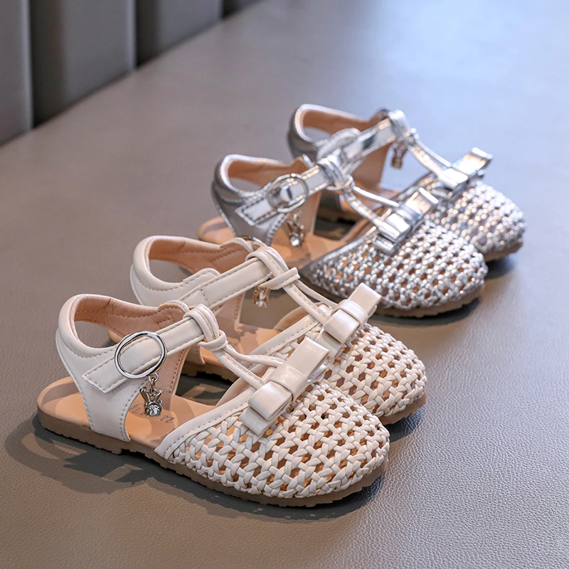 

Summer Girls Woven Flat Sandals New Trend Bowknot Children Fashion Causal Beach Sandals T-strap Hollow-out Kids Princess Shoes