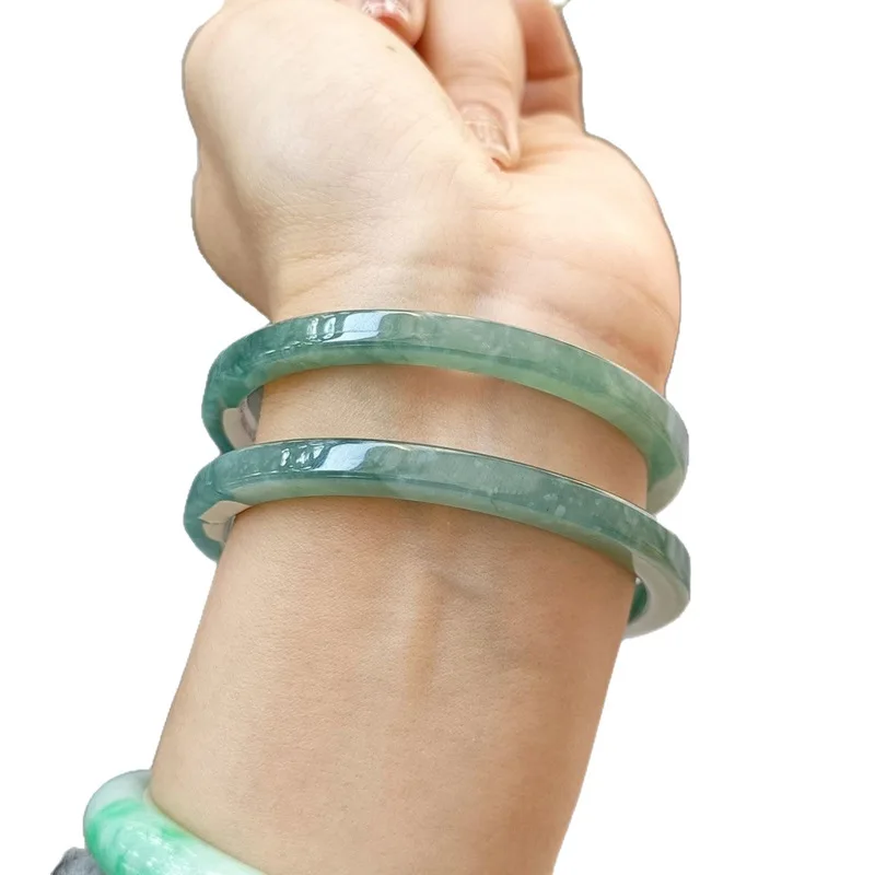 Natural Jadeite A-grade fine  icy texture -clear and smooth with a gelatinous feel ice blue water thin recta