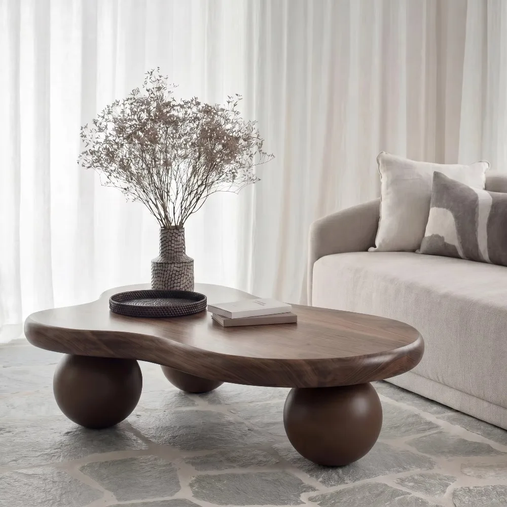 Modern Designer Brown Coffee Table with Cloud-Shaped Irregular Form and Ball Legs for Living Room Decor