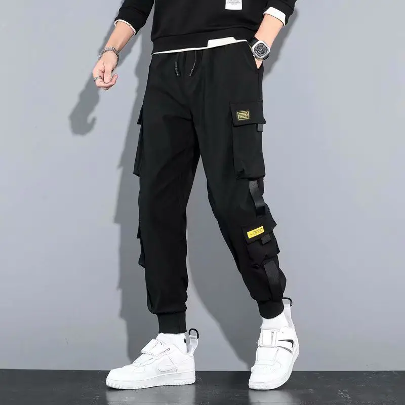 Fashion Personality Multiple Pockets Stickers Waist Drawcord Cargo Pants Man Loose Solid Color Casual Summer Trend Male Trousers