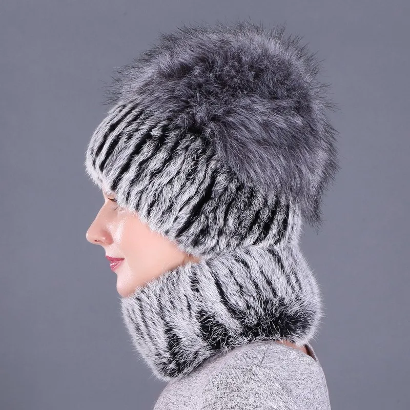 A fashionable woolen hat for women warm scarf thickened imitation ball with ear