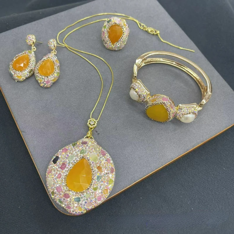 

Natural Malay jade inlaid with multi-colored small stone four-piece set of high-end luxury female wedding banquet accessories