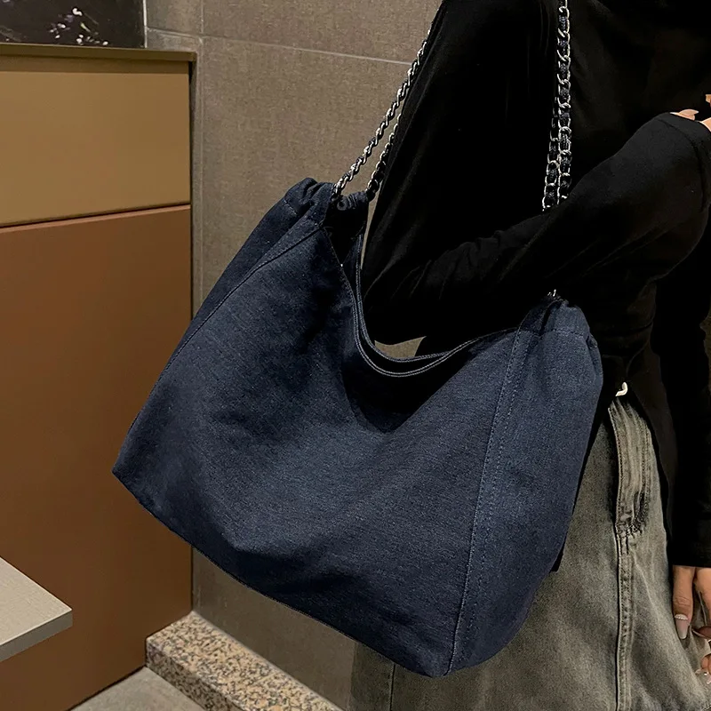 Picture 5: Denim durable women's single-shoulder bag, large-capacity drawstring drawstring opening commuter travel crossbody bag