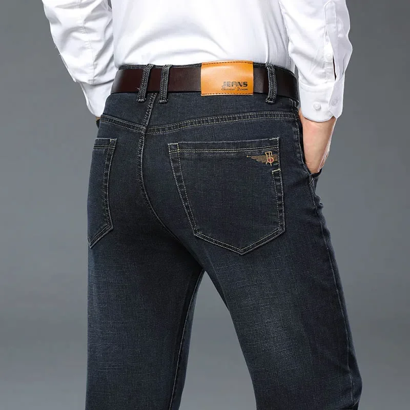 حجم كبير 42 44 46 ربيع الخريف الرجال موضة جينز غير رسمي أسود أزرق الأعمال الكلاسيكية مستقيم مرونة العلامة التجارية سراويل جينز