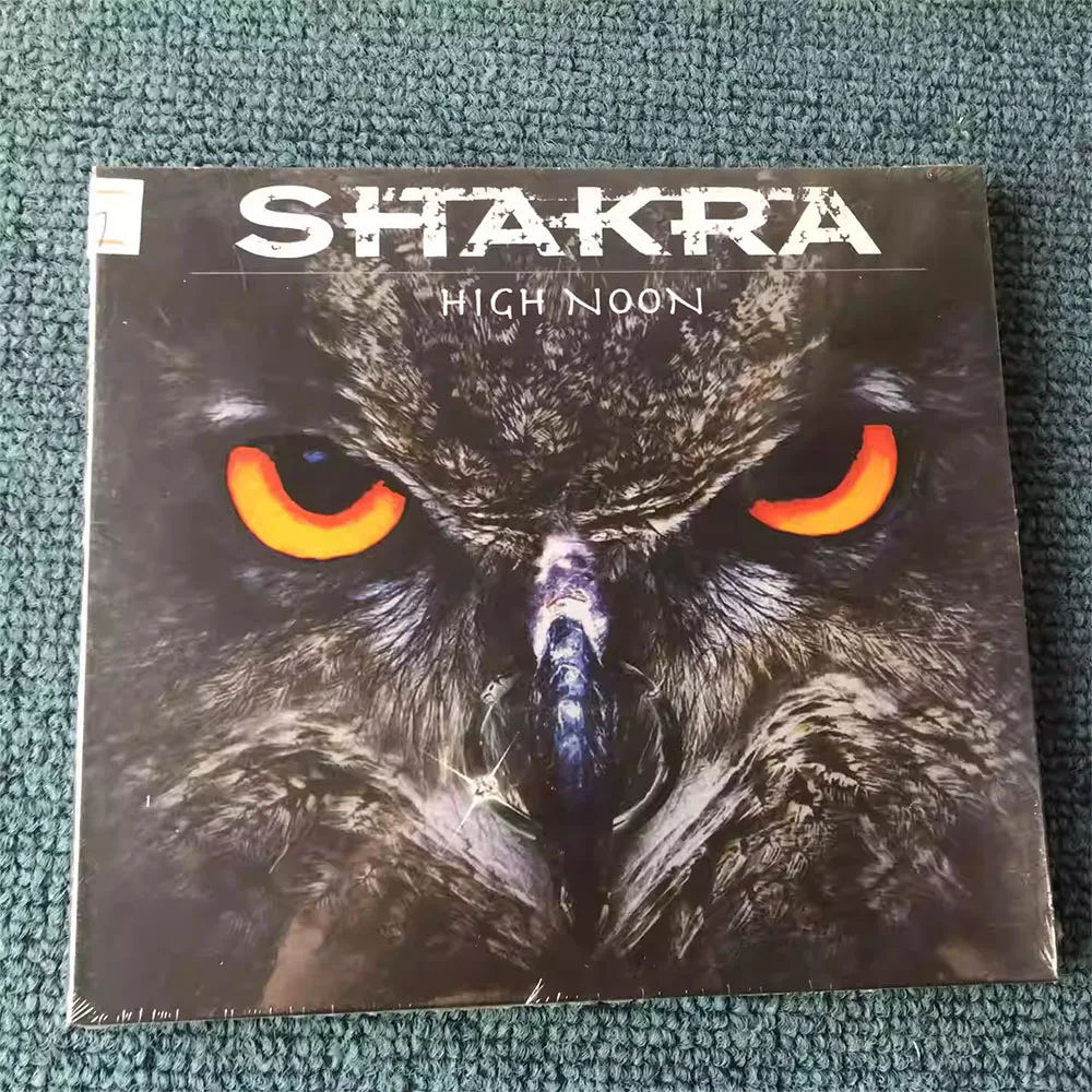 

CD 'High Noon Shakra' Is A Studio Album By Swiss Power Metal/hard Rock Band Shakra. The Record Delivers A High-energy, Melodic