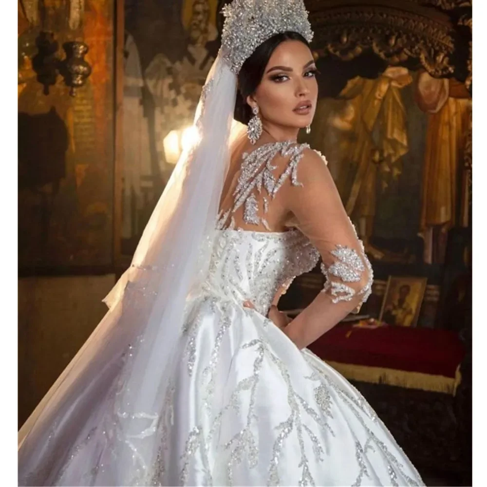 تخصيص مغرفة الرقبة تسلق الخرز الترتر فستان الزفاف Vestidos De Novia طويلة الأكمام العربية Ballgown منتفخ فستان زفاف