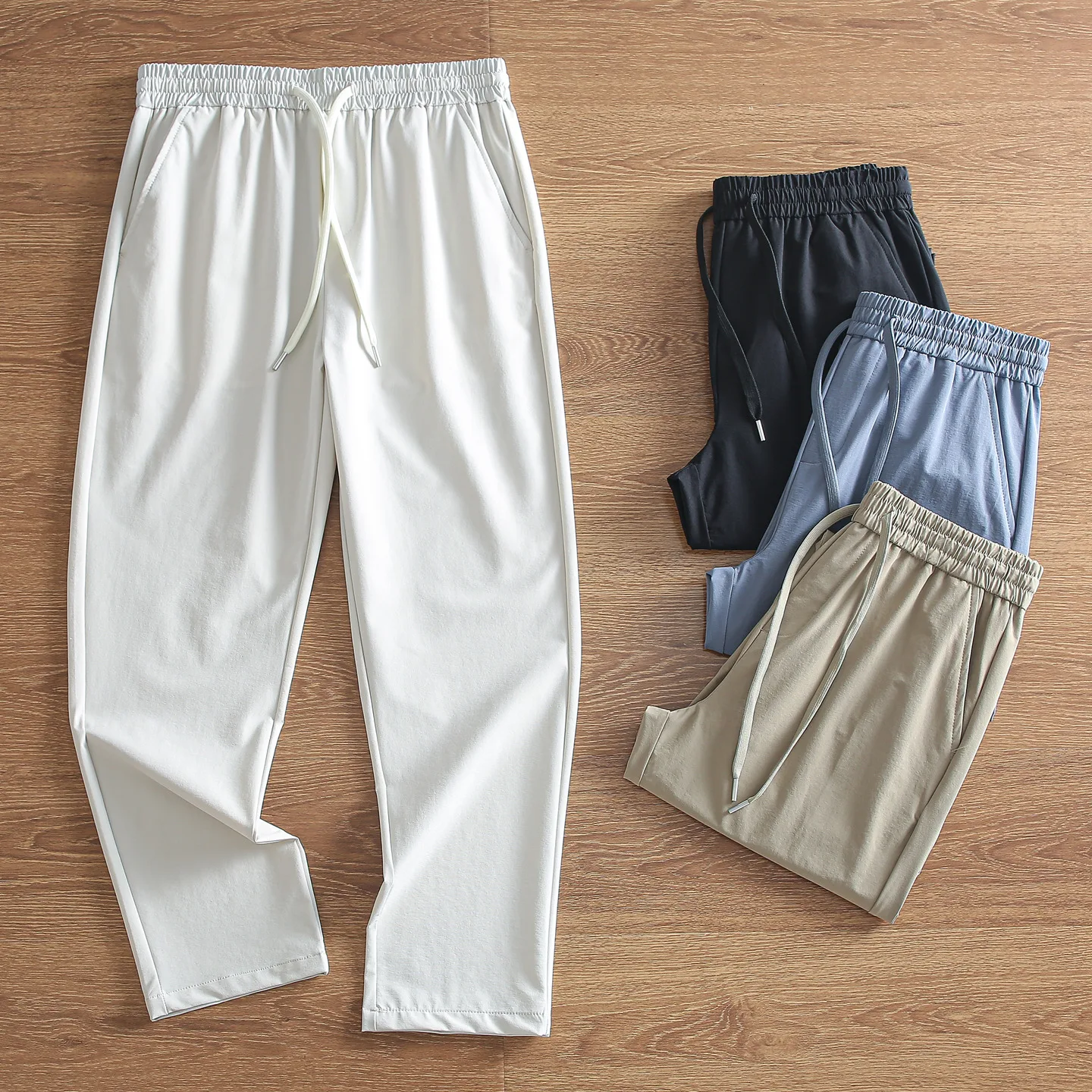 

Men's Spring Summer 2026 Waterproof Elastic Qui Dry Straight Leg Casual Trousers Faionable Woven Sports Pants