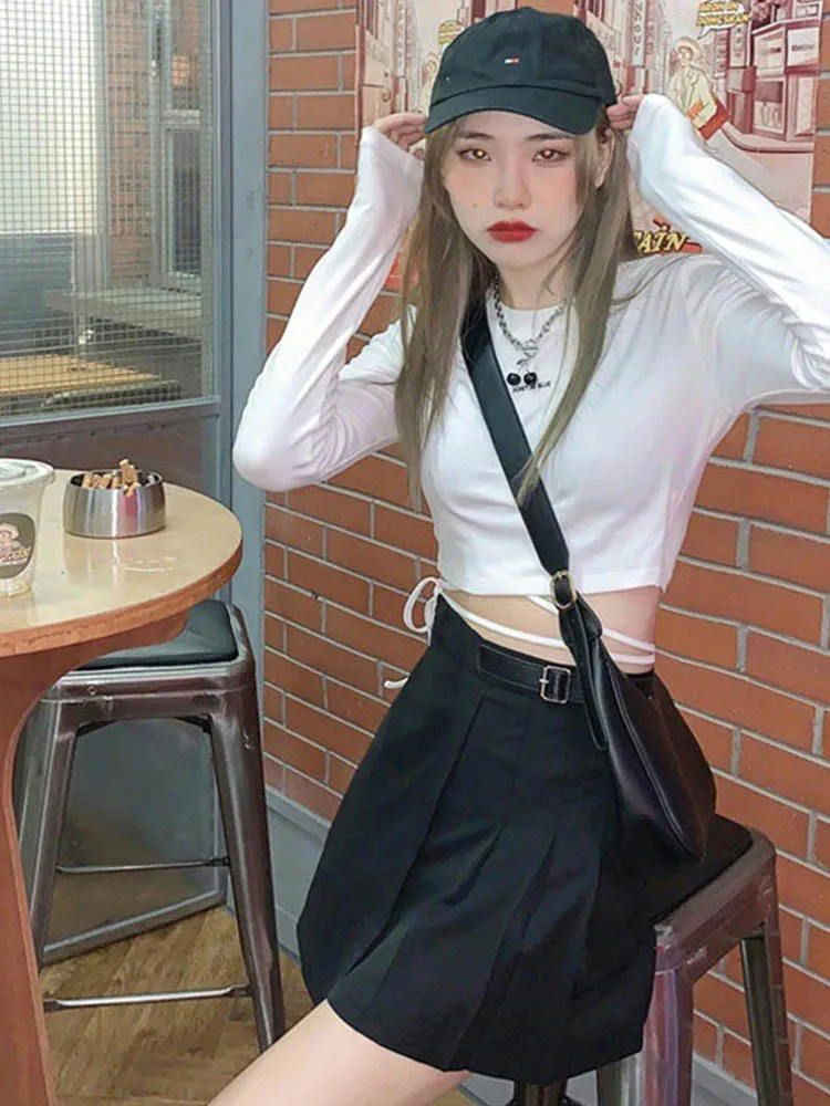 เสื้อยืดแขนยาวผู้หญิงดีไซน์เซ็กซี่ครอปท็อปแบบแบนเดจที่แพร่หลายเสื้อฮาราจูกุออลจังสตรีทฤดูใบไม้ผลิ