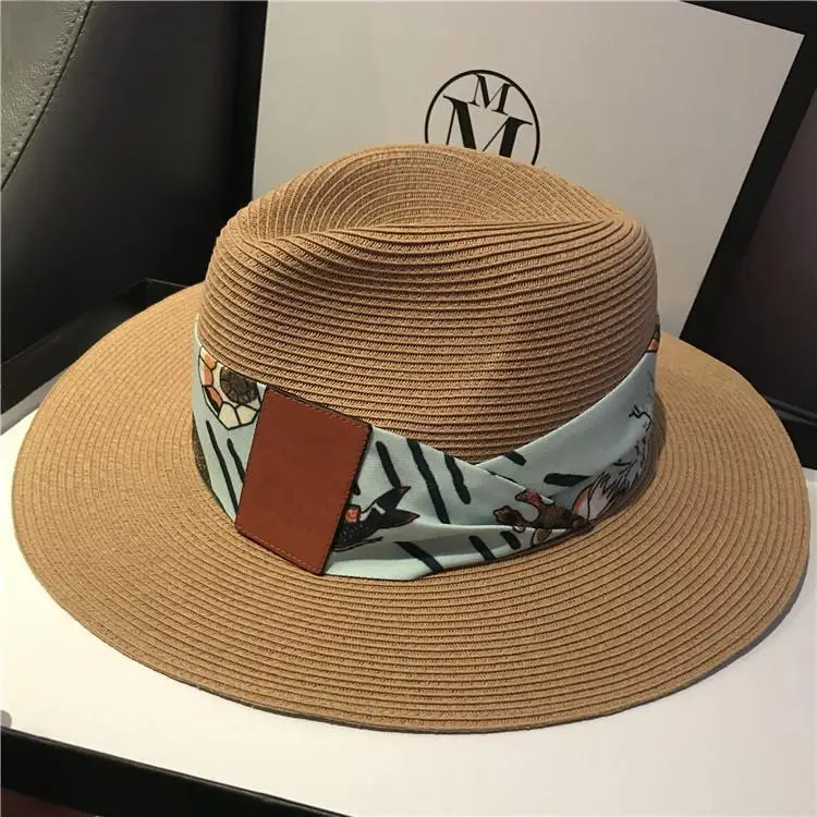 

Luxury Designer Brand 2024 New High Quality Summer Straw Hat Seaside Holiday Wind Wide Eaves Sunshade Top Hat for Women Hot Sale