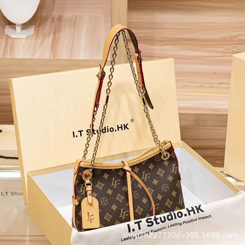 

Luxury Business Casual Crossbody Handbag For Women With Textured Finish And Classic Letter Logo Designed As A Roomy Diaper Bag