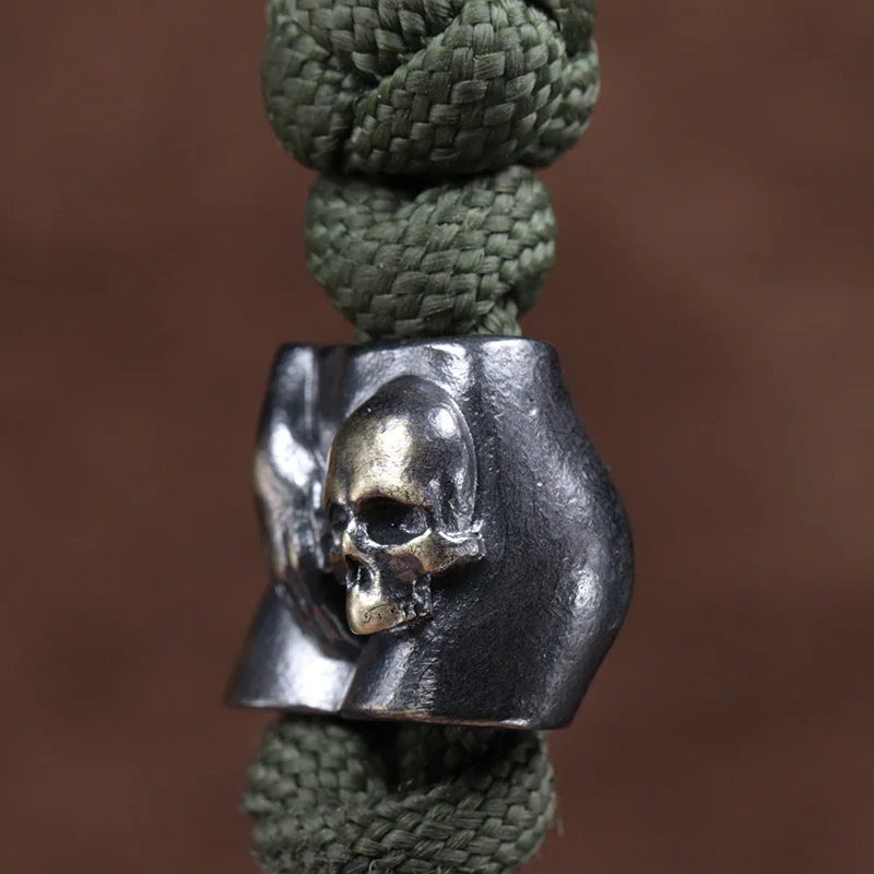 اليد الجمجمة رئيس النحاس سكين الخرز الشرير EDC في الهواء الطلق لتقوم بها بنفسك Paracord المنسوجة الحبل المعلقات الرجعية مظلة حبل أساور اكسسوارات