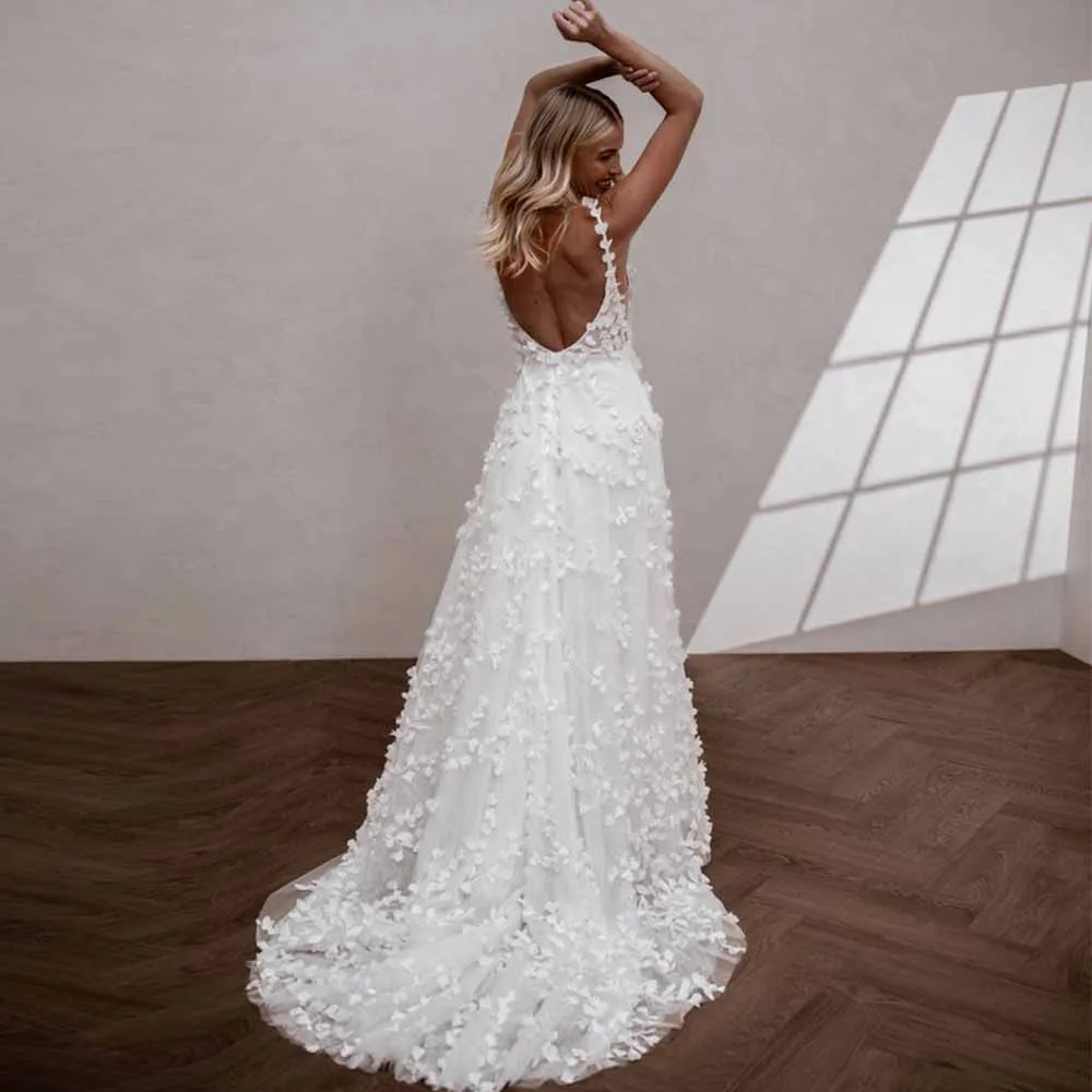 فساتين نسائية أنيقة تريند 2025 تول فساتين زفاف على شكل حرف a للحفلات فستان زفاف أبيض بحزام سباغيتي بدون ظهر