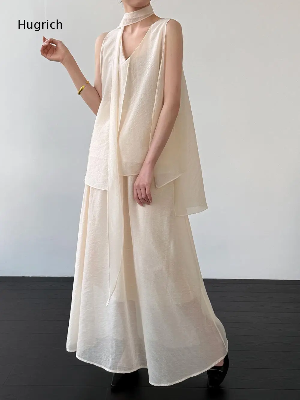 Light Airy Textured Fabric Two Piece Outfit Sleeveless Self Tie Neck Layered Top High Waist Wide Floor Length Pants For Women