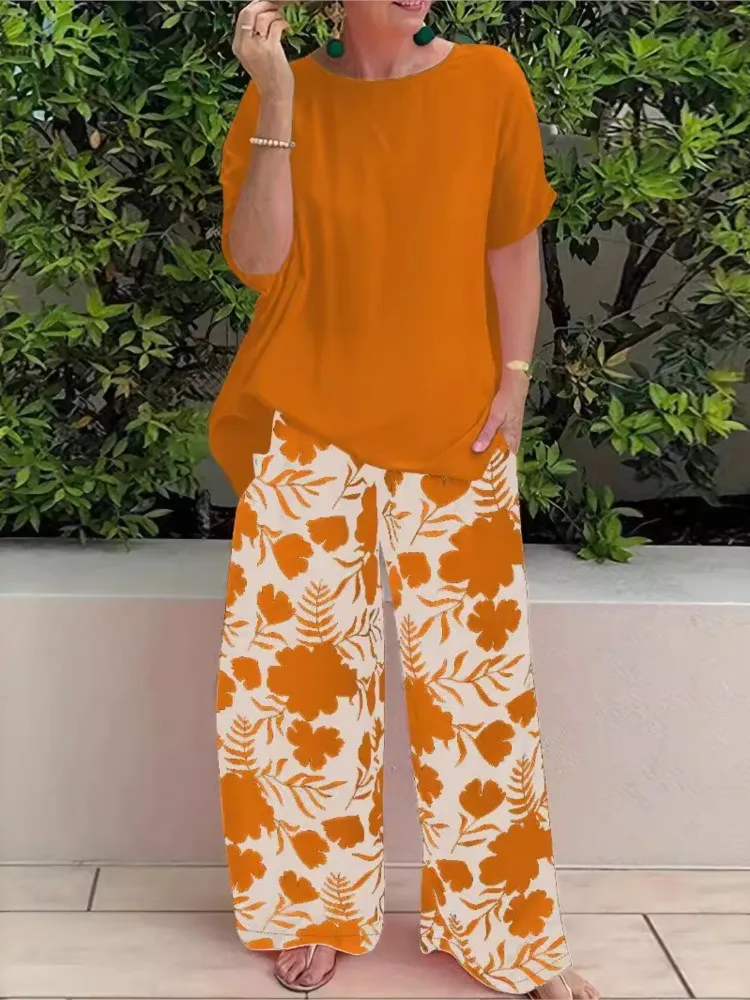 Set casual da donna Top a maniche corte larghi solidi e pantaloni lunghi a gamba larga con stampa Set da 2 pezzi per le donne Abiti estivi da donna