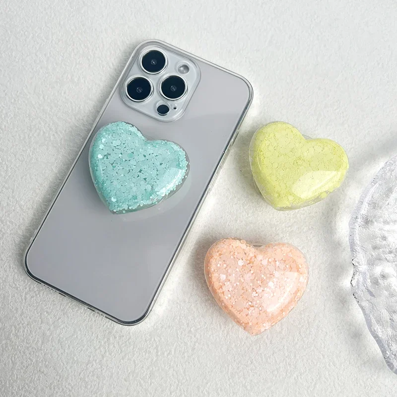 حامل هاتف على شكل قلب لامع جديد، حامل قابل للطي لسطح المكتب كسول، قبضة هاتف على شكل قلب لامع من ماكرون