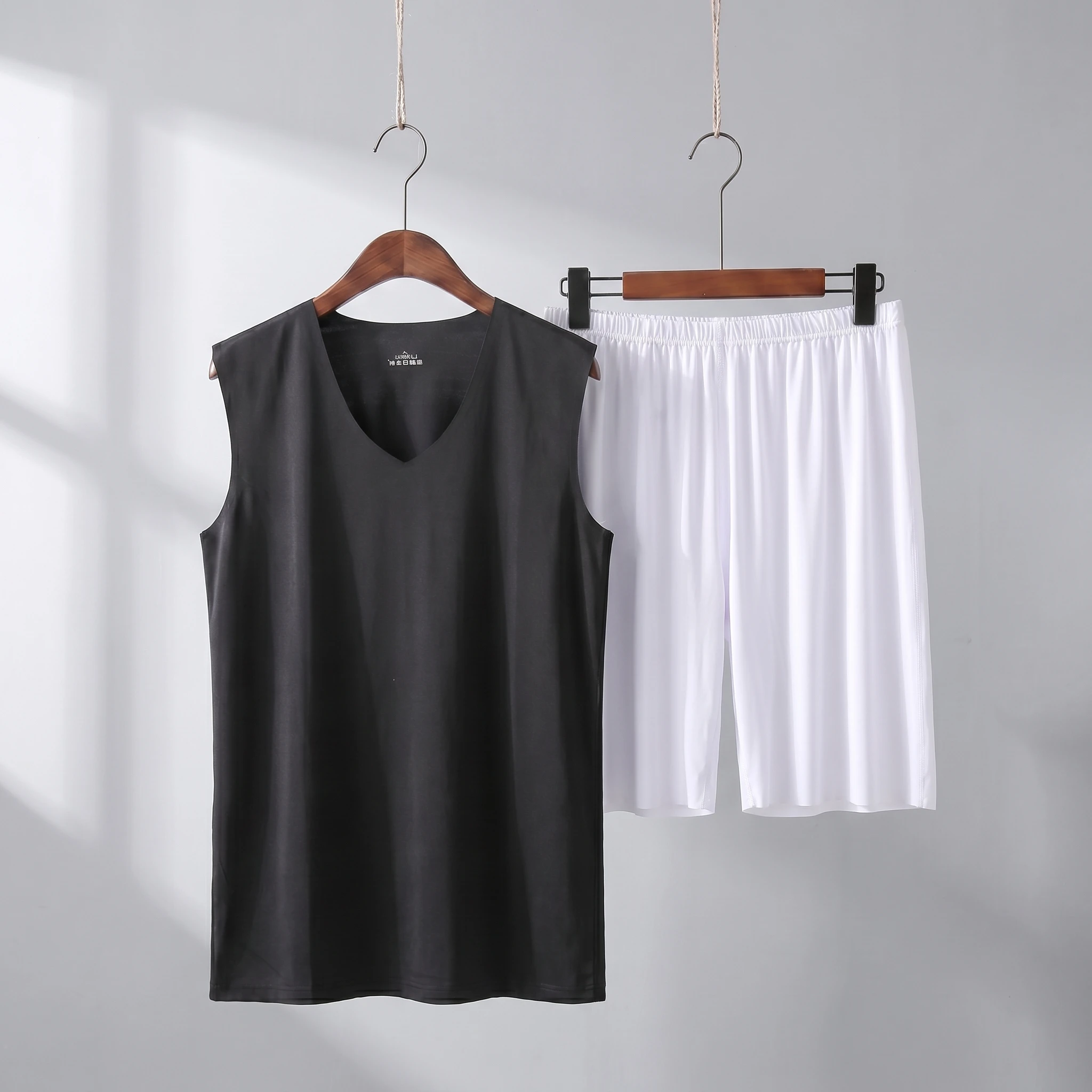 Black vest + white shorts