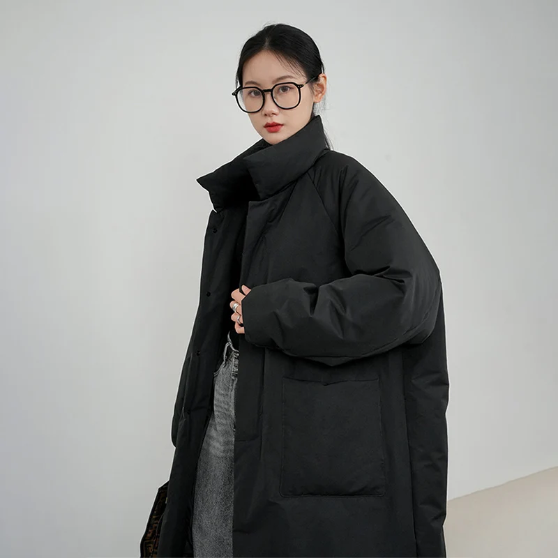 2025年冬 ロング丈 中綿コート レディース トレンド オーバーサイズ ゆったり スタンドカラー パーカー 女性らしい気質 ボタン付き 大きめポケット ジャケット