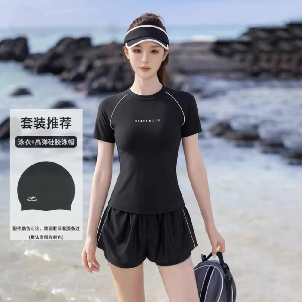 Black [swimsuit + swimming cap]