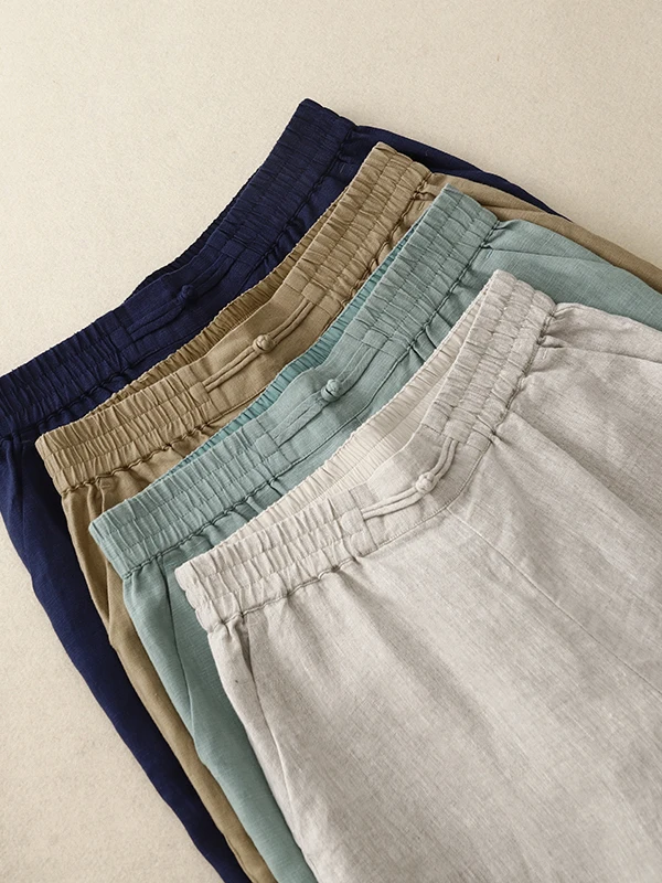 シンプルなピュアカラーコットンリネンワイドレッグパンツ女性の夏の新スタイル通勤カジュアルルーズドレープストレートレッグパンツ