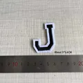 J